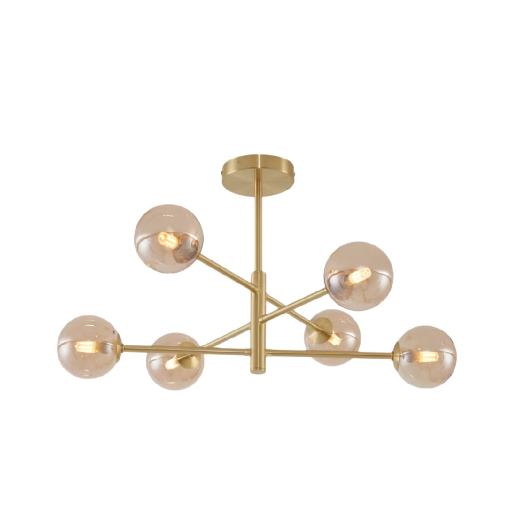 Suspension en laiton avec six globes en verre transparent.